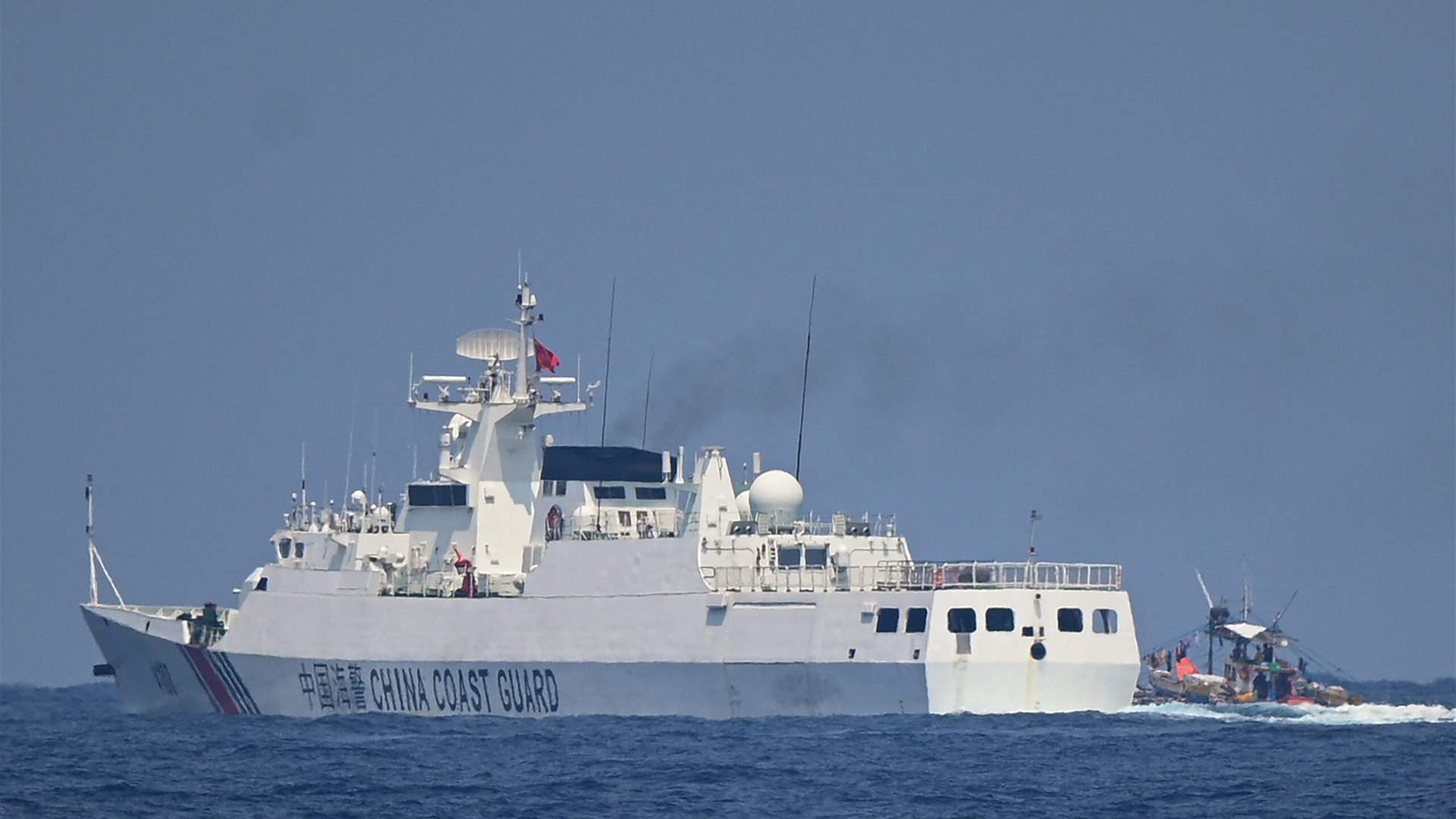 Philippines says Chinese coast guard boarded navy vessels in South China Sea 