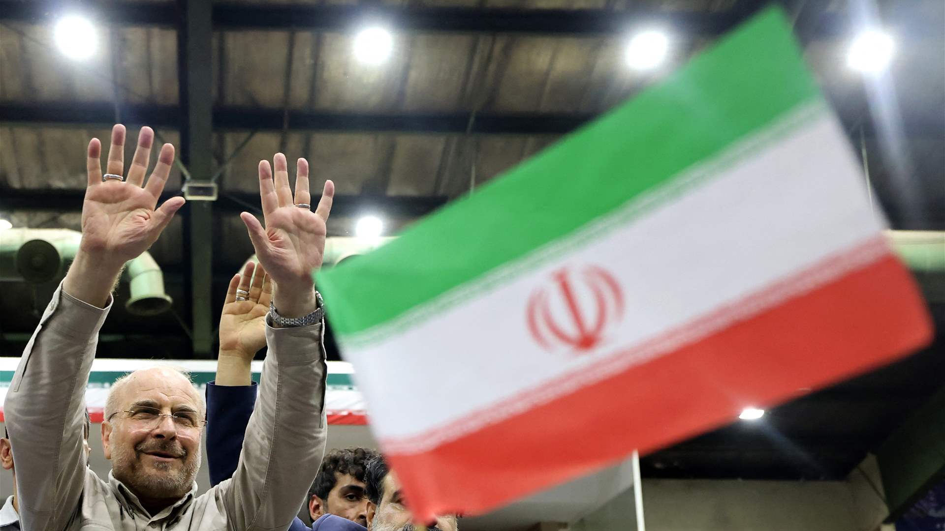 Polls open in Iran for snap presidential election