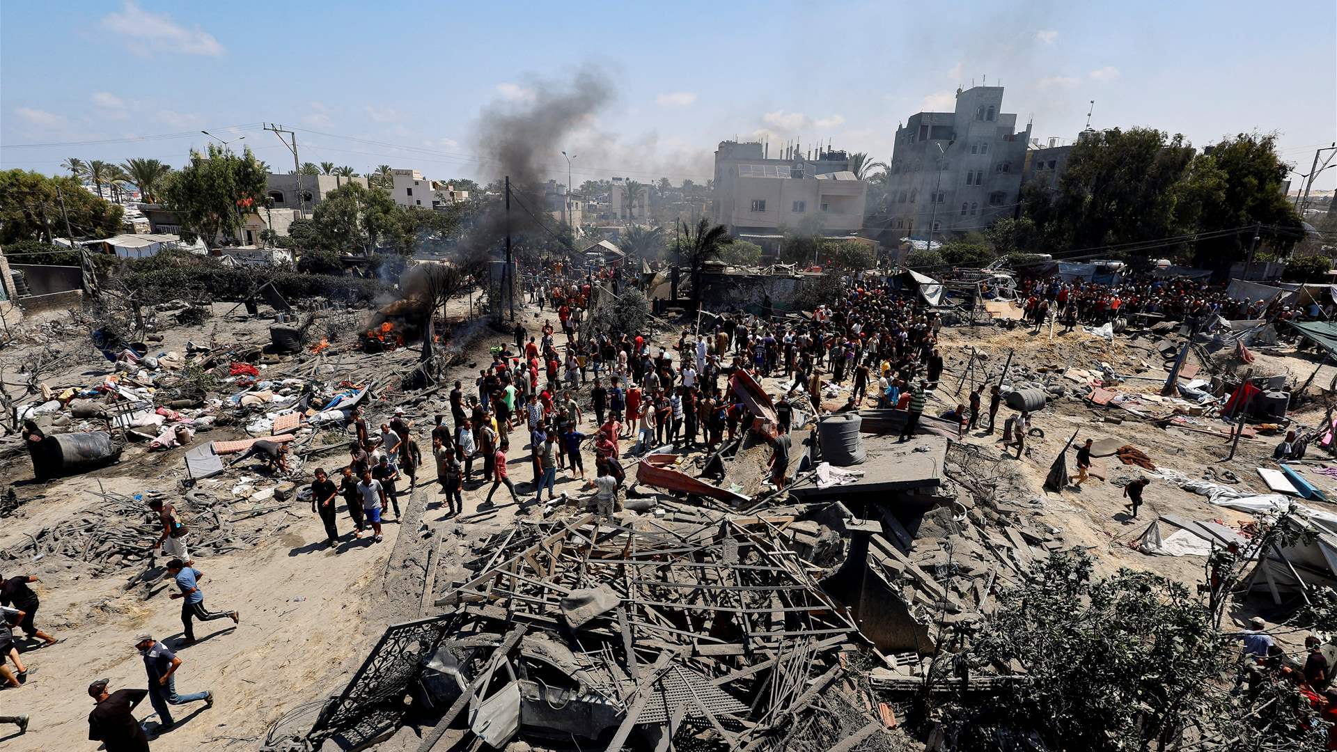 Israel demands more Gaza evacuations after school shelter attack kills scores