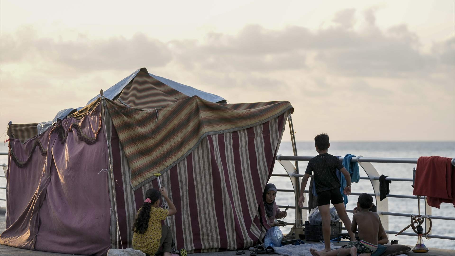 Beirut authorities relocate over 400 displaced individuals from coastal camps to Karantina shelter