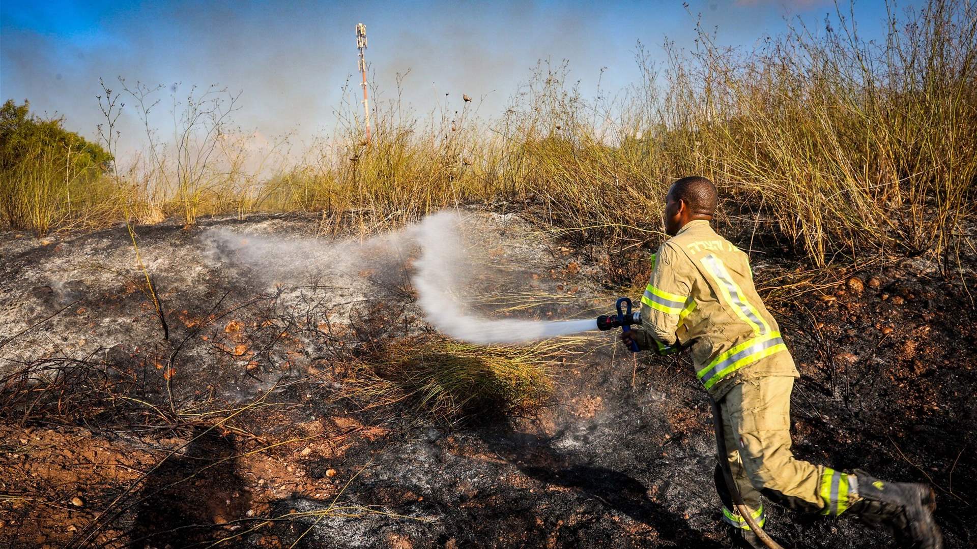 Blaze near Jerusalem sparked by missile or interception, firefighters say