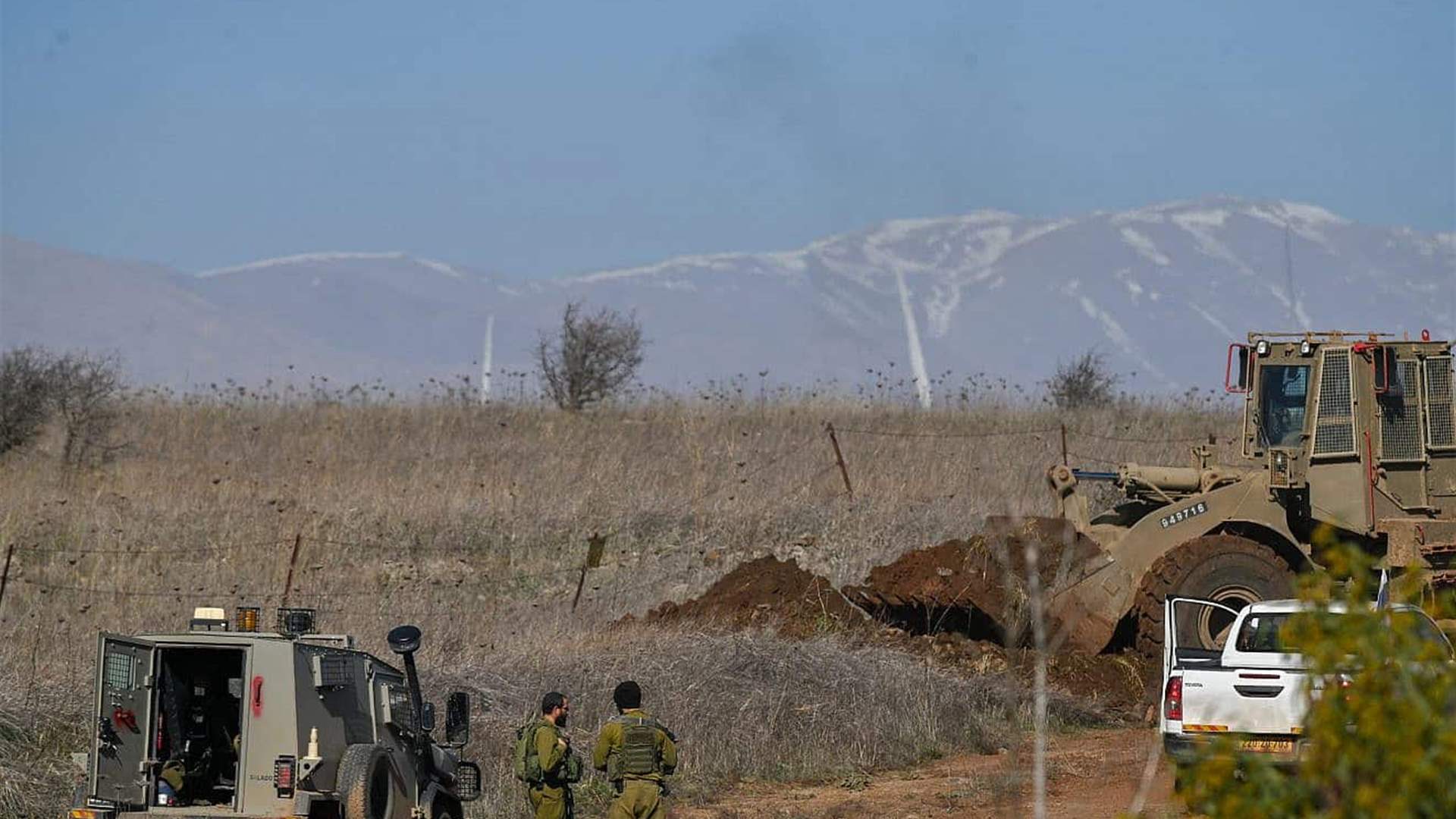 Israeli military continues digging deep trench along border and ceasefire line with Syria