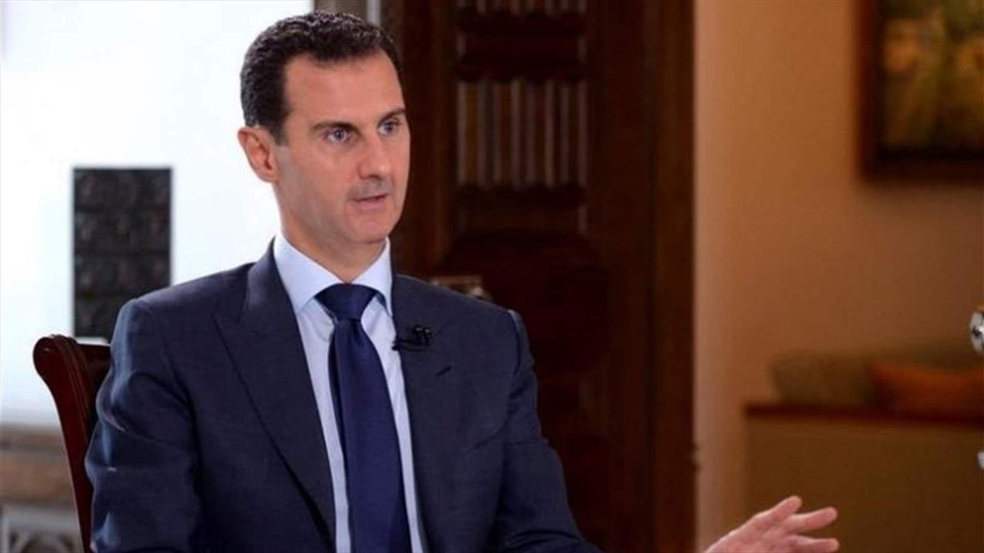 Turkey FM says Assad &#39;probably outside of Syria&#39;