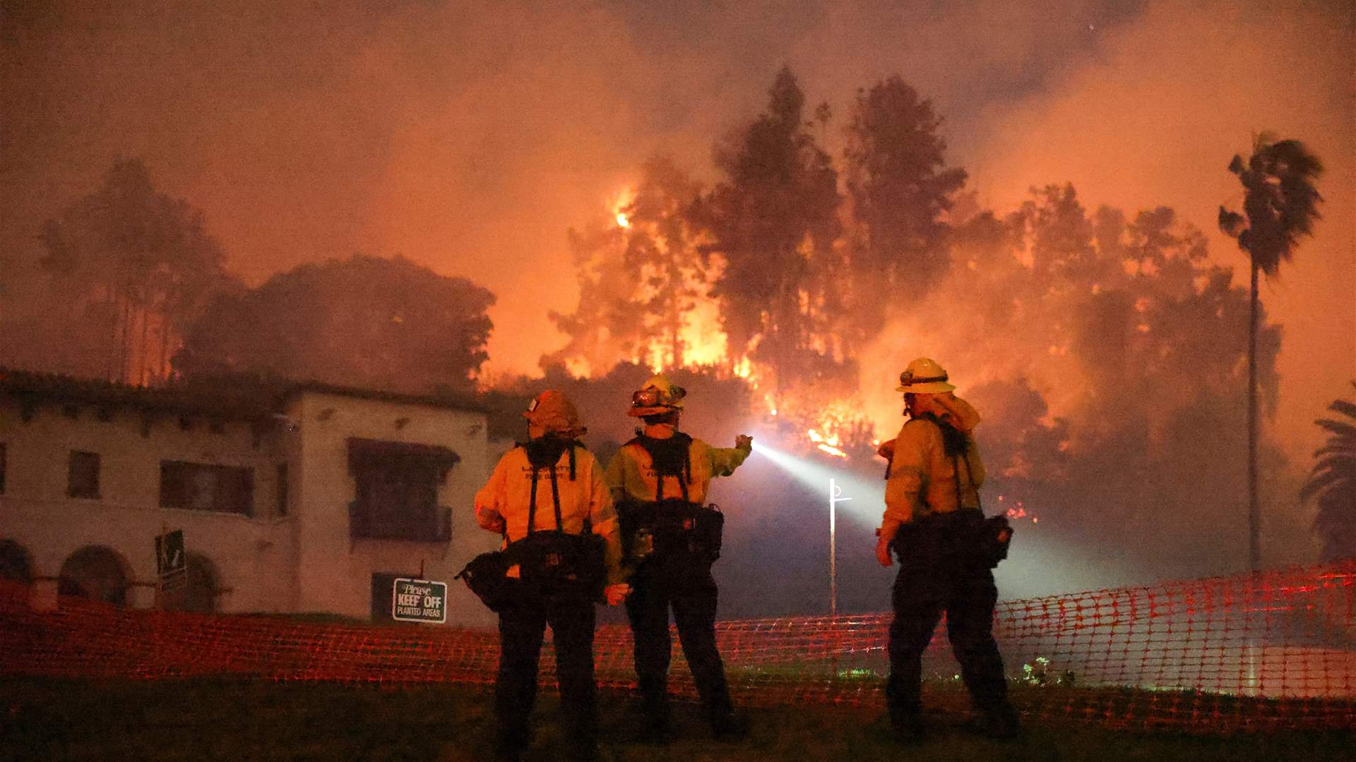 Los Angeles wildfires devour thousands of homes even as fierce winds ease