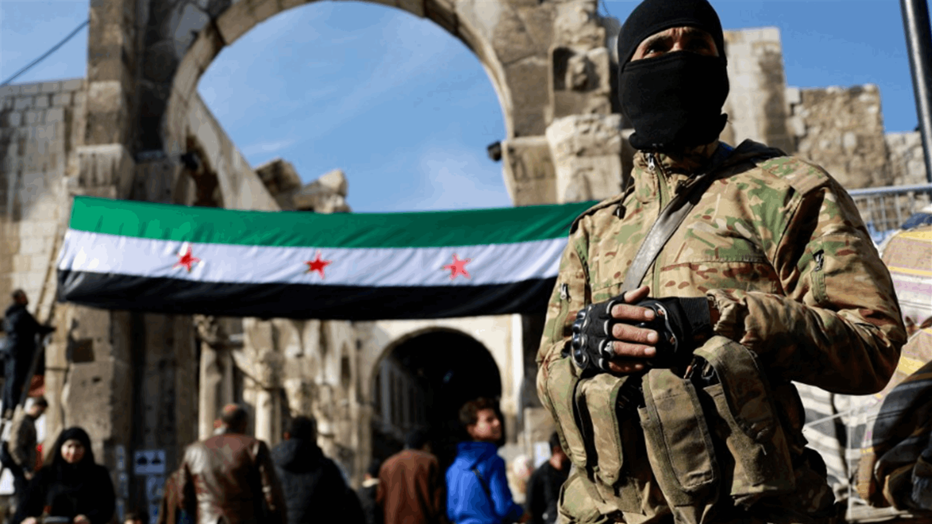 Syria monitor says alleged Assad loyalist &#39;executed&#39; in public