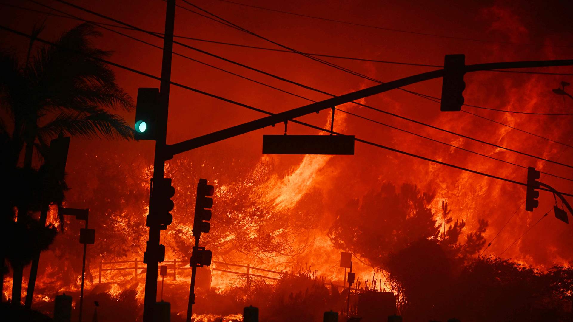 Los Angeles inquires fire blame as strict curfew enforced