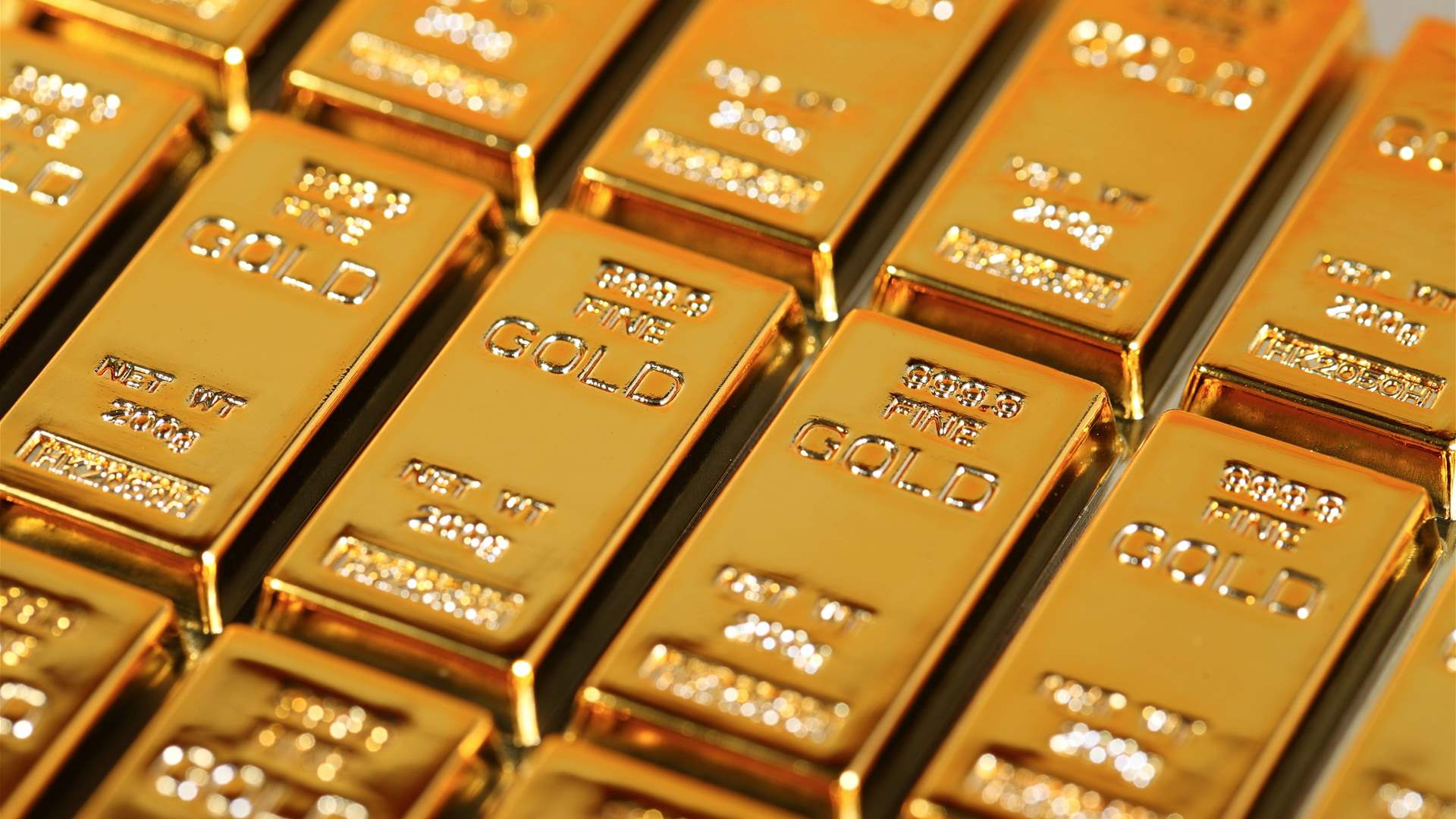 Gold climbs to 11-week peak on Trump policy jitters, soft dollar