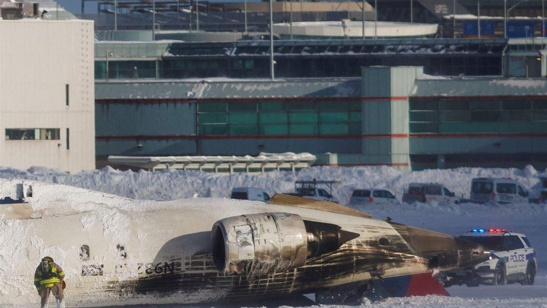 Delta plane flips upside down on landing at Toronto airport, injuring 18