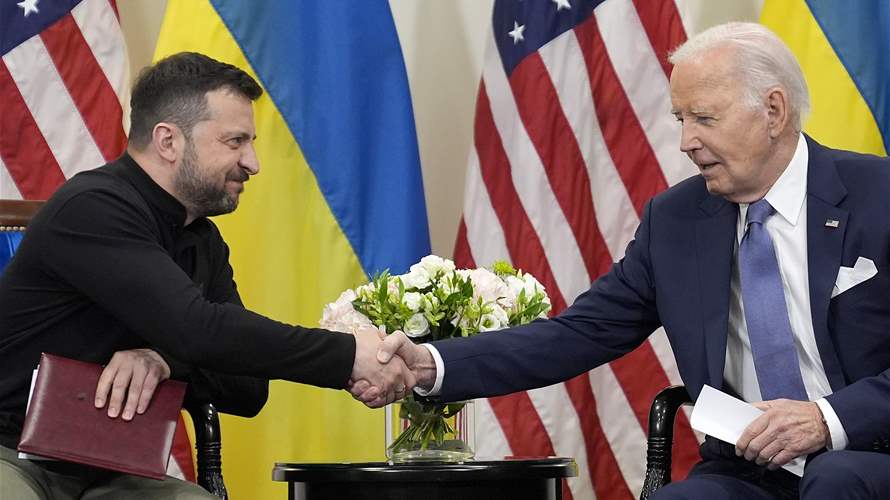 Biden meets Zelenskyy in Paris, pledges support for Ukraine