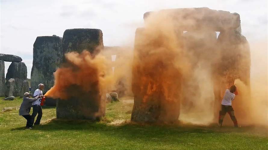 UK police: Two held after Stonehenge sprayed with orange substance