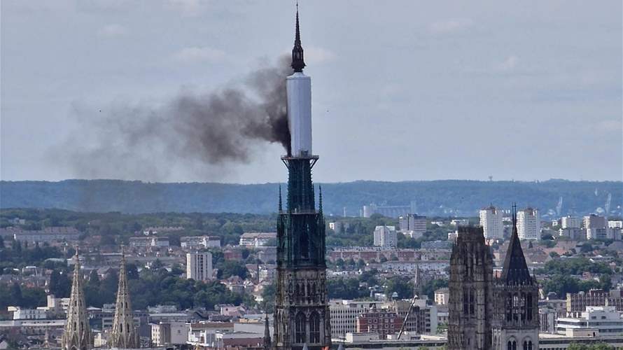 Rouen cathedral spire catches fire, firefighters working to control blaze