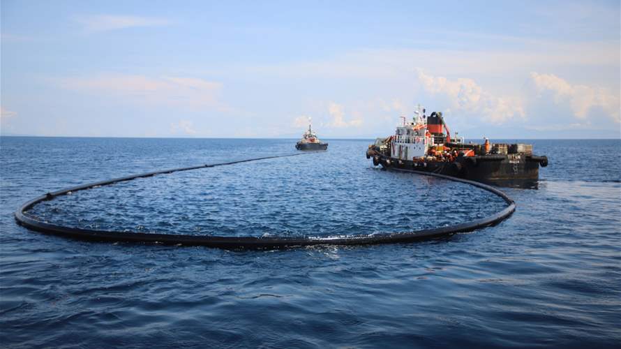 Philippine coast guard says oil leaking from sunken tanker