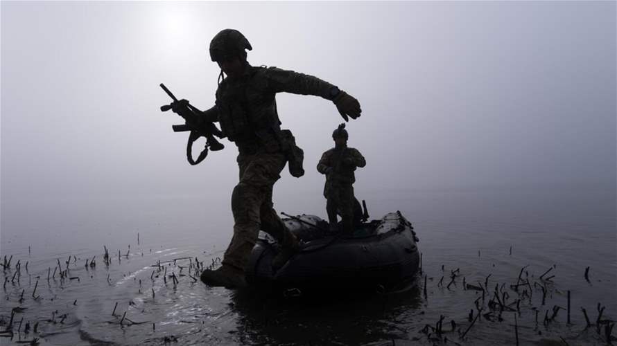 Kyiv says repels Russian push over east Ukraine river