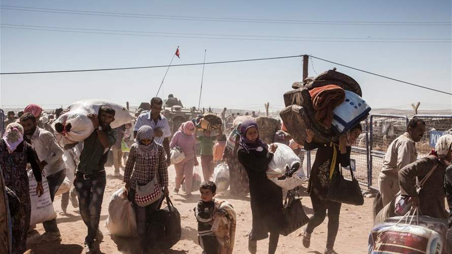 UN migration agency chief says some religious minorities fleeing Syria