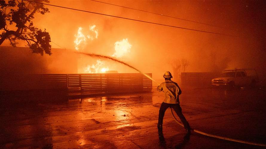 Los Angeles wildfires spread to Hollywood as 100,000 ordered to evacuate