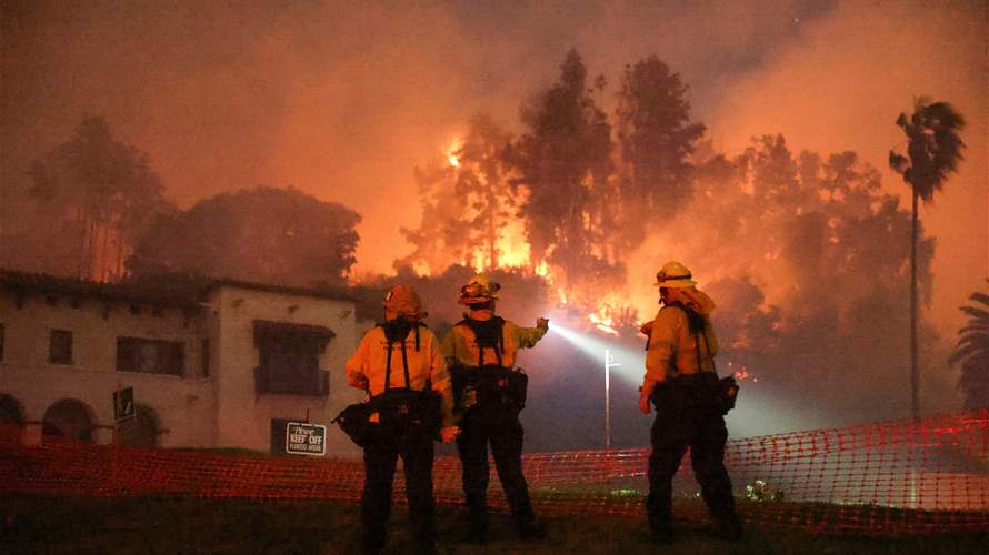 Los Angeles wildfires devour thousands of homes even as fierce winds ease