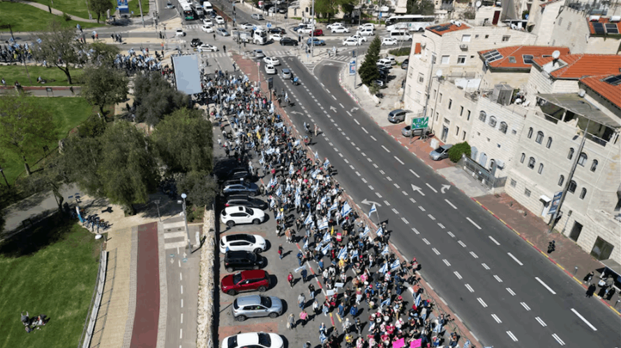 Defying protests, Israeli cabinet reported to be seeking attorney general's removal